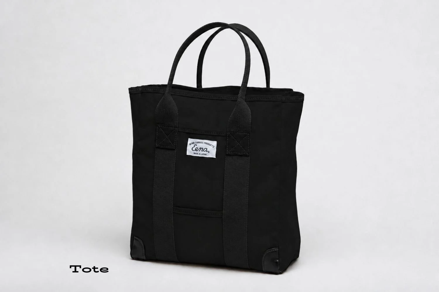 all black tote made of canvas in studio