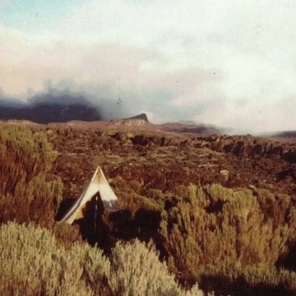 miner tent in desert landscape under blue skies