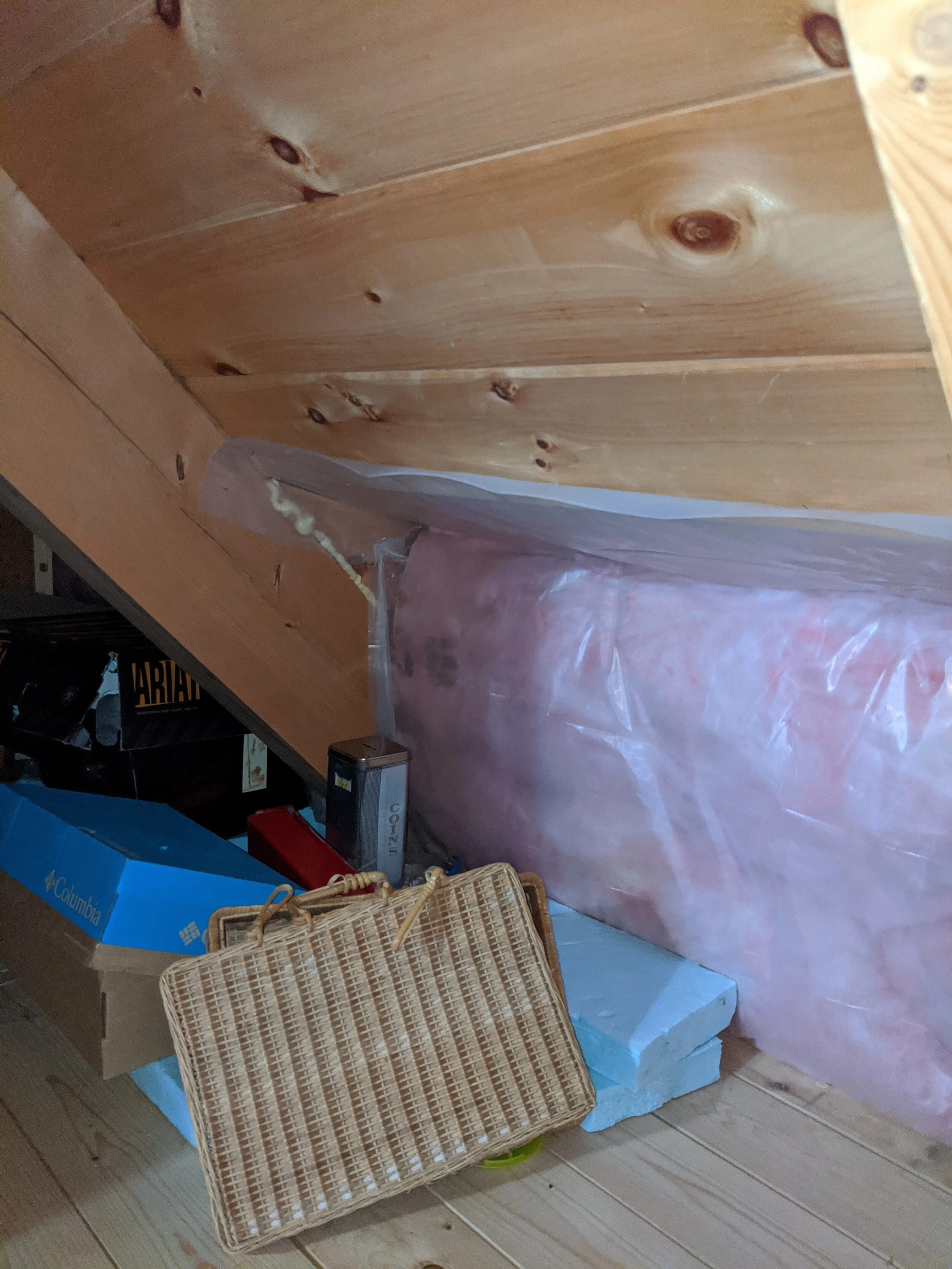 BEFORE- A junk repository crawlspace