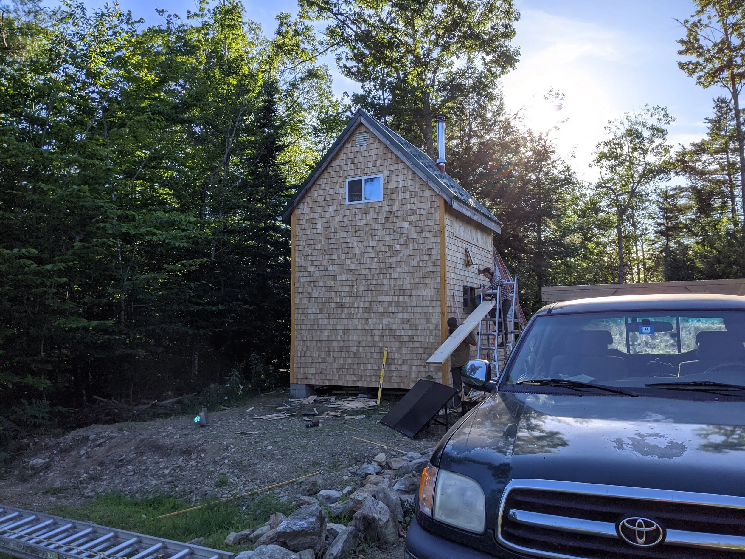 New eastern white cedar shingle siding for this cabin Summer 2020