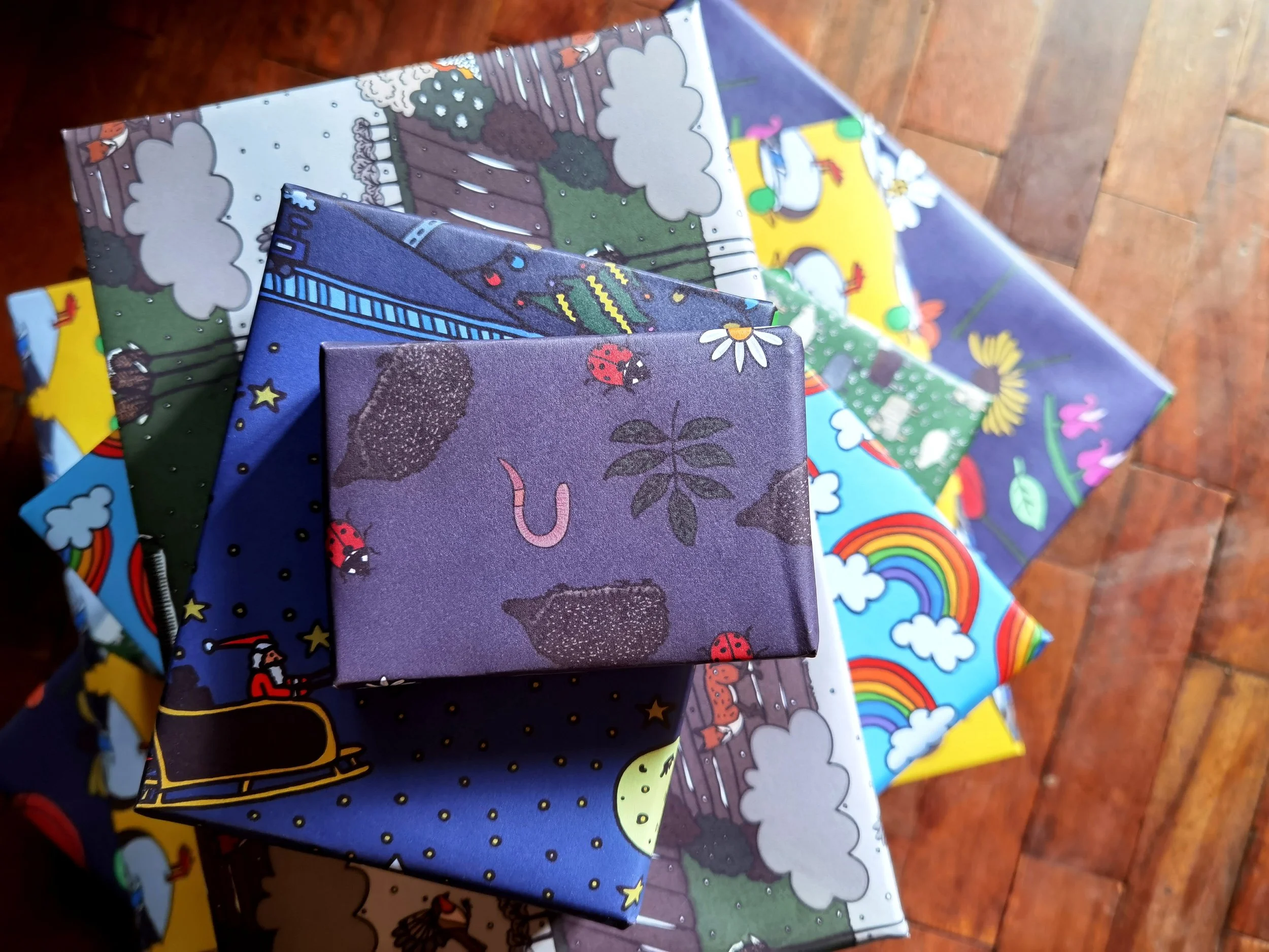 Pile of presents wrapped in colourful exclusive posh wrapping paper