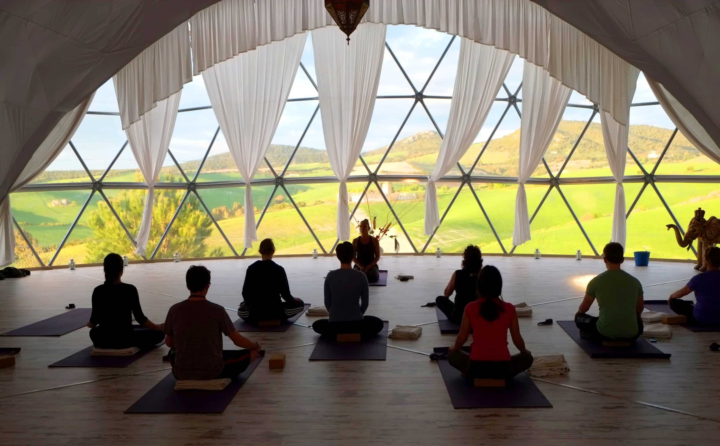 Daily yoga in the Om Dome with views over the Andalusian countryside.jpeg
