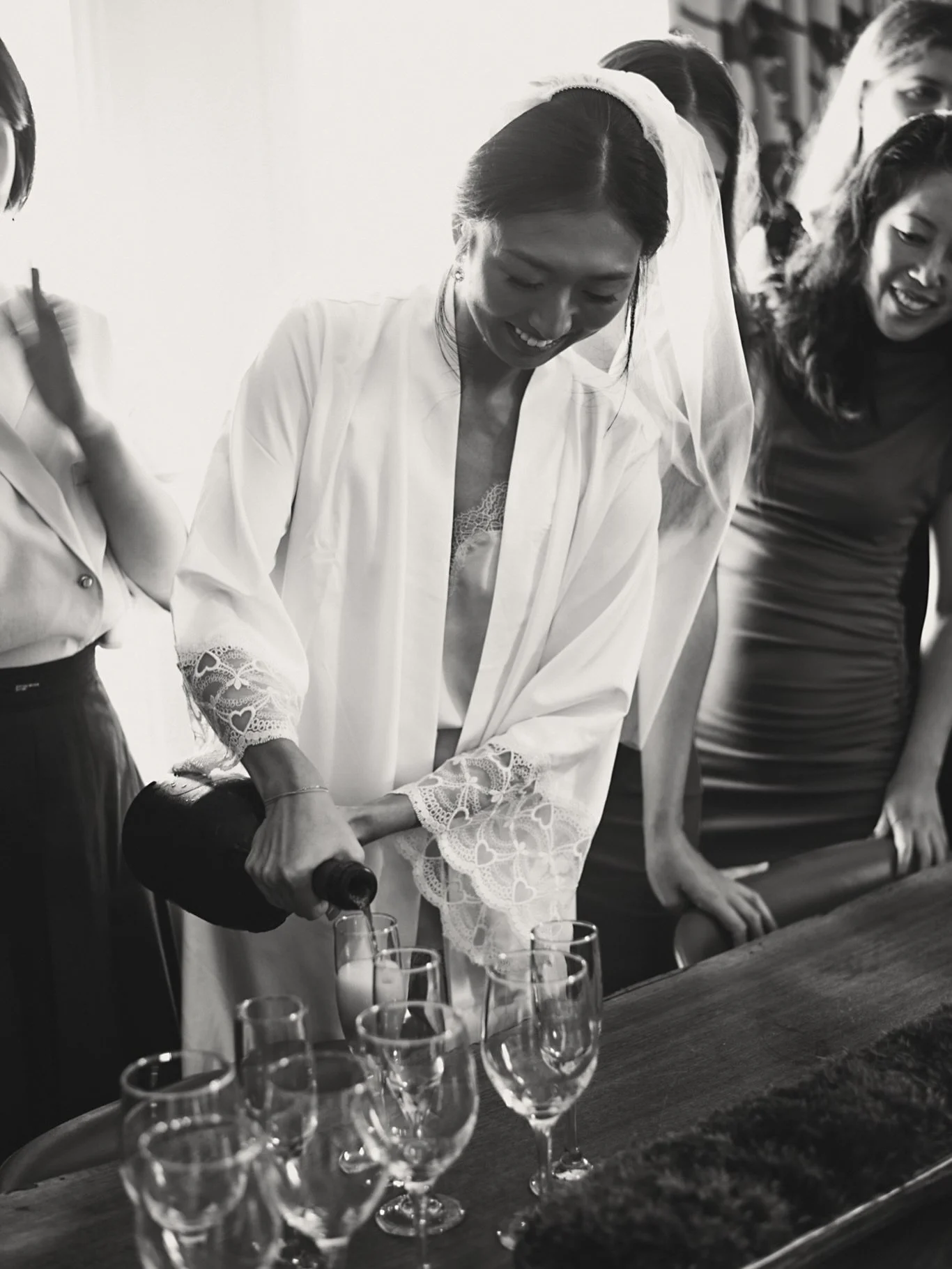The moments before the chaos, the quiet champagne pours, and the energy in the room when your favorite people surround you. There&rsquo;s a distinct art to documenting the getting-ready portion of the day, candid, unscripted, and entirely effortless.