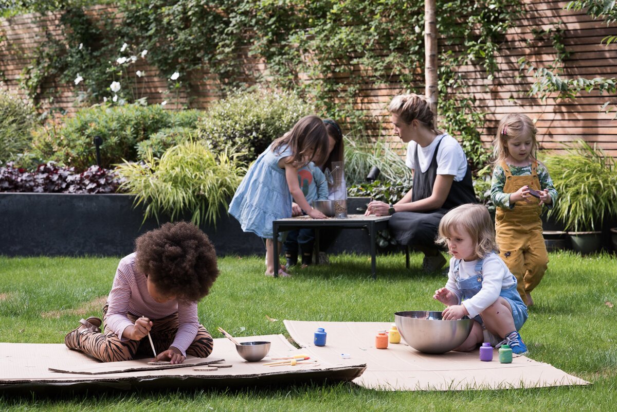  Children playing in the garden. 