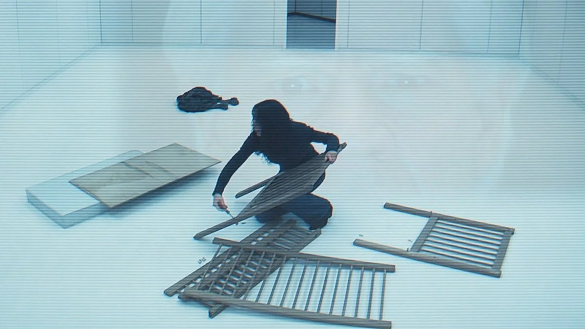 Gemma tries to assemble a crib in a heartbreaking scene in Apple TV's 'Severance' exploring the impossible separation of the workplace and family