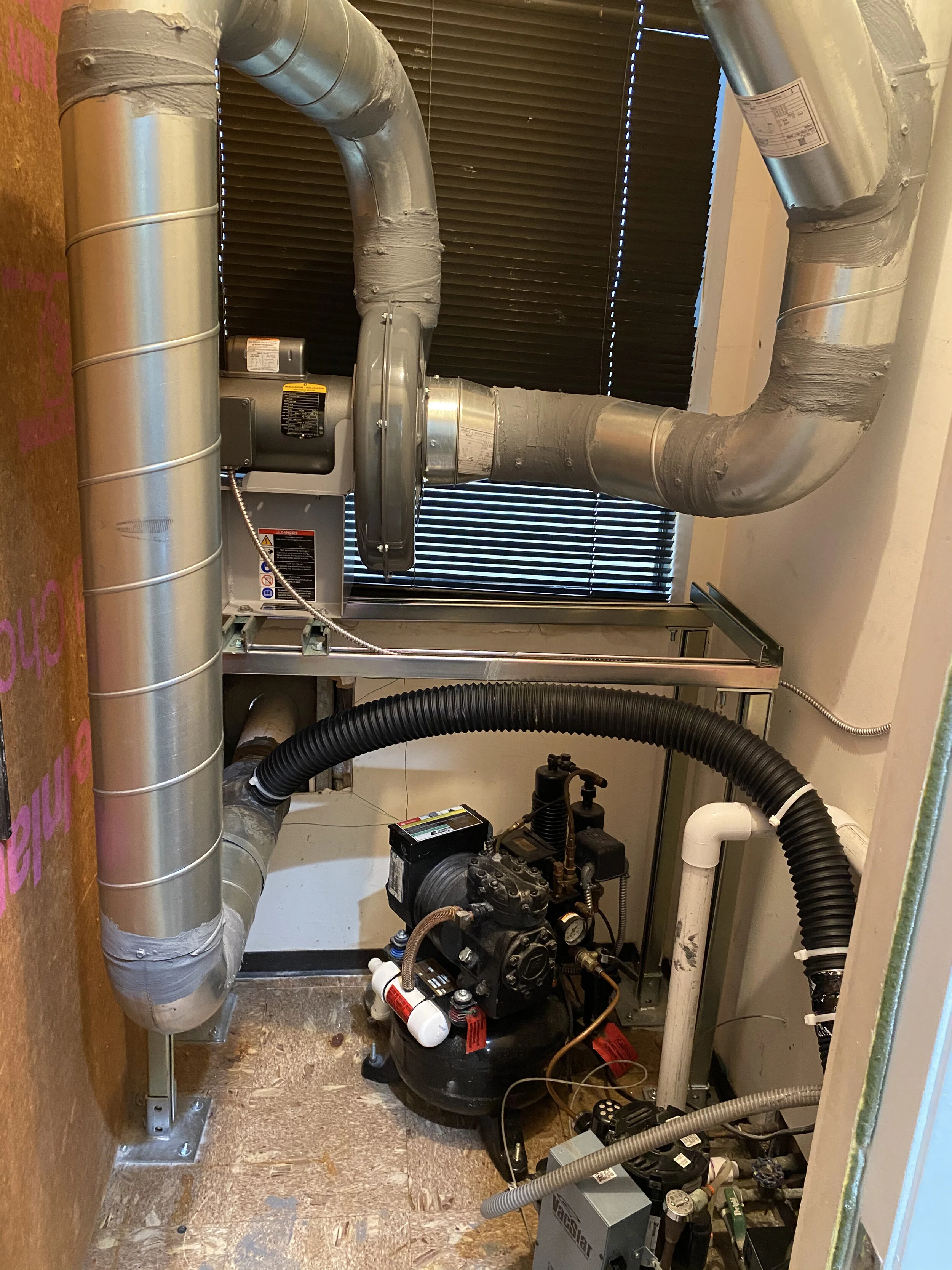 Nederman exhaust fan /Air-Water Separator/HVAC ductwork vented to Outside Air with enclosed water drainage.