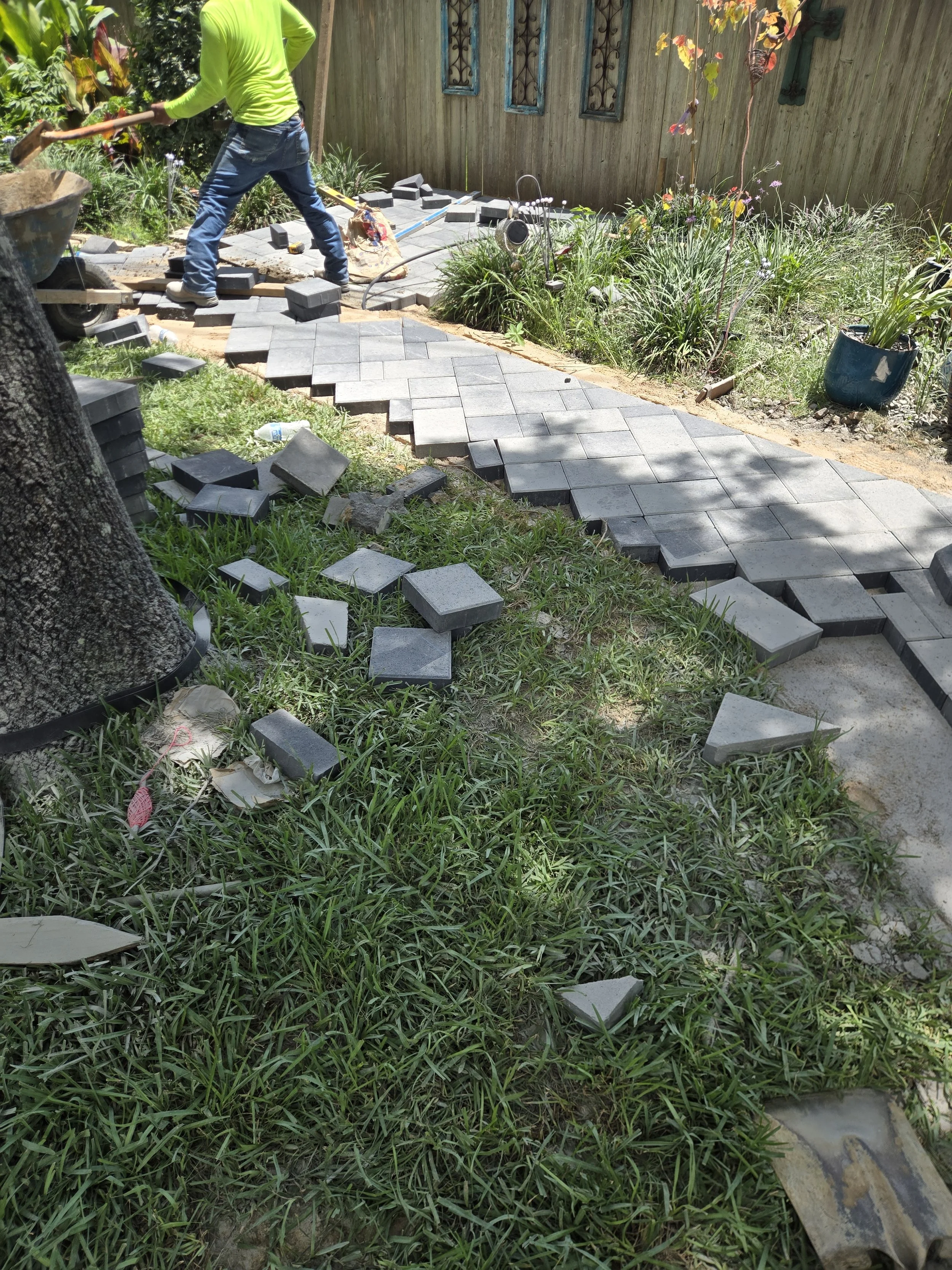 This is an image of a paver walkway in progress, in southeast houston