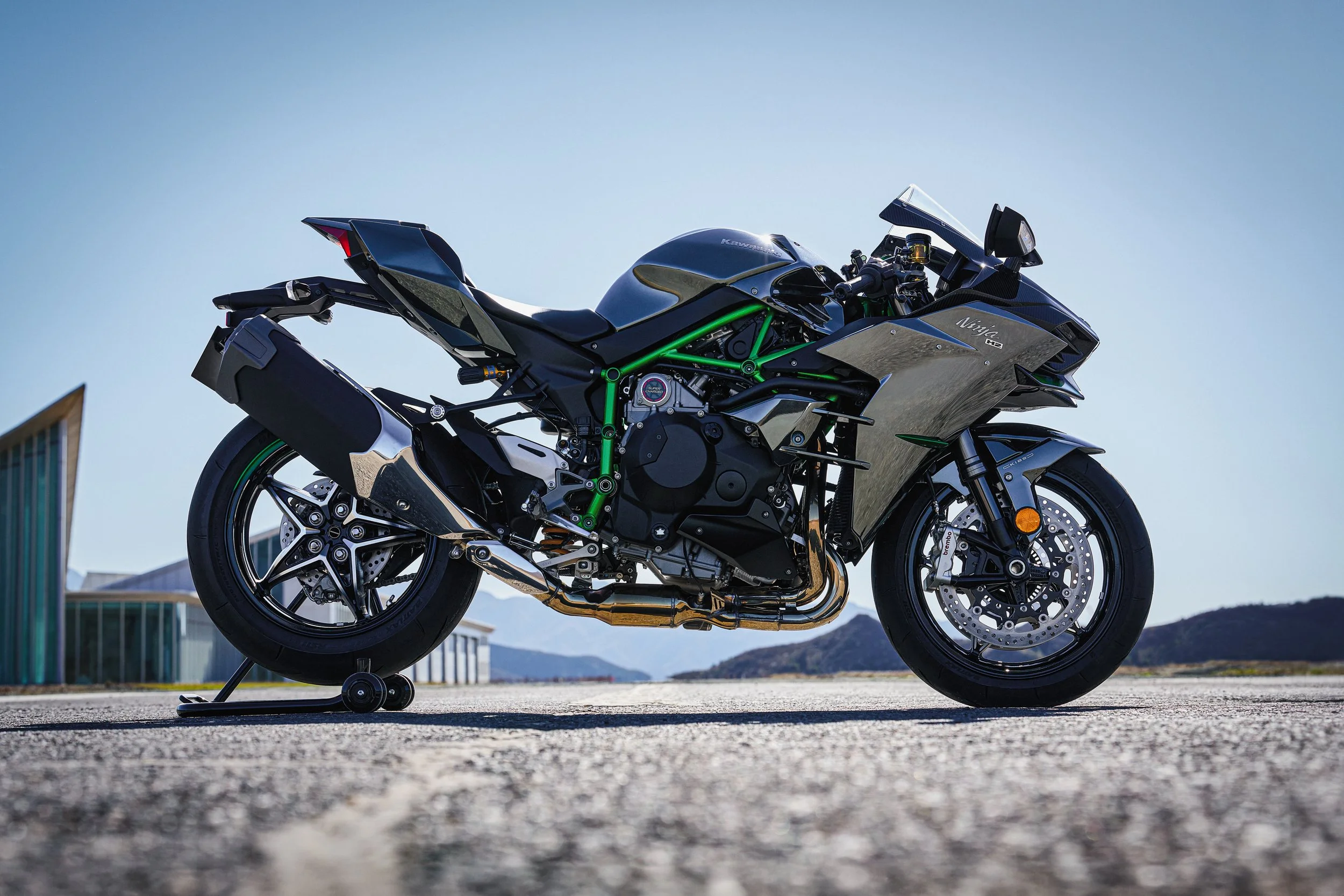 The latest iteration of the famous Ninja H2 proudly takes its place as an evolution of Kawasaki’s supercharged flagship series - side view of motorcycle