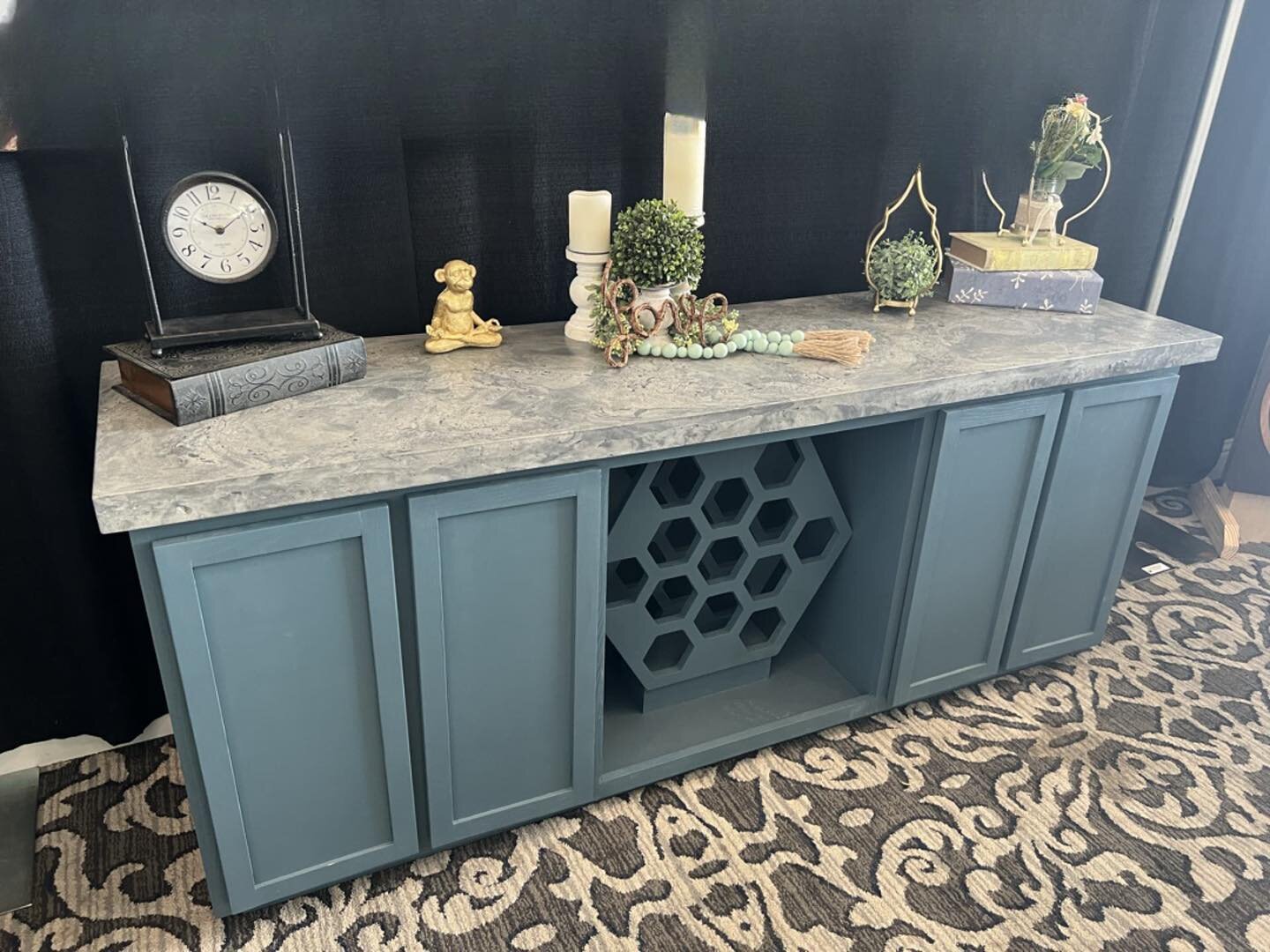 Made a credenza and added a honeycomb wine holder with a custom concrete top.