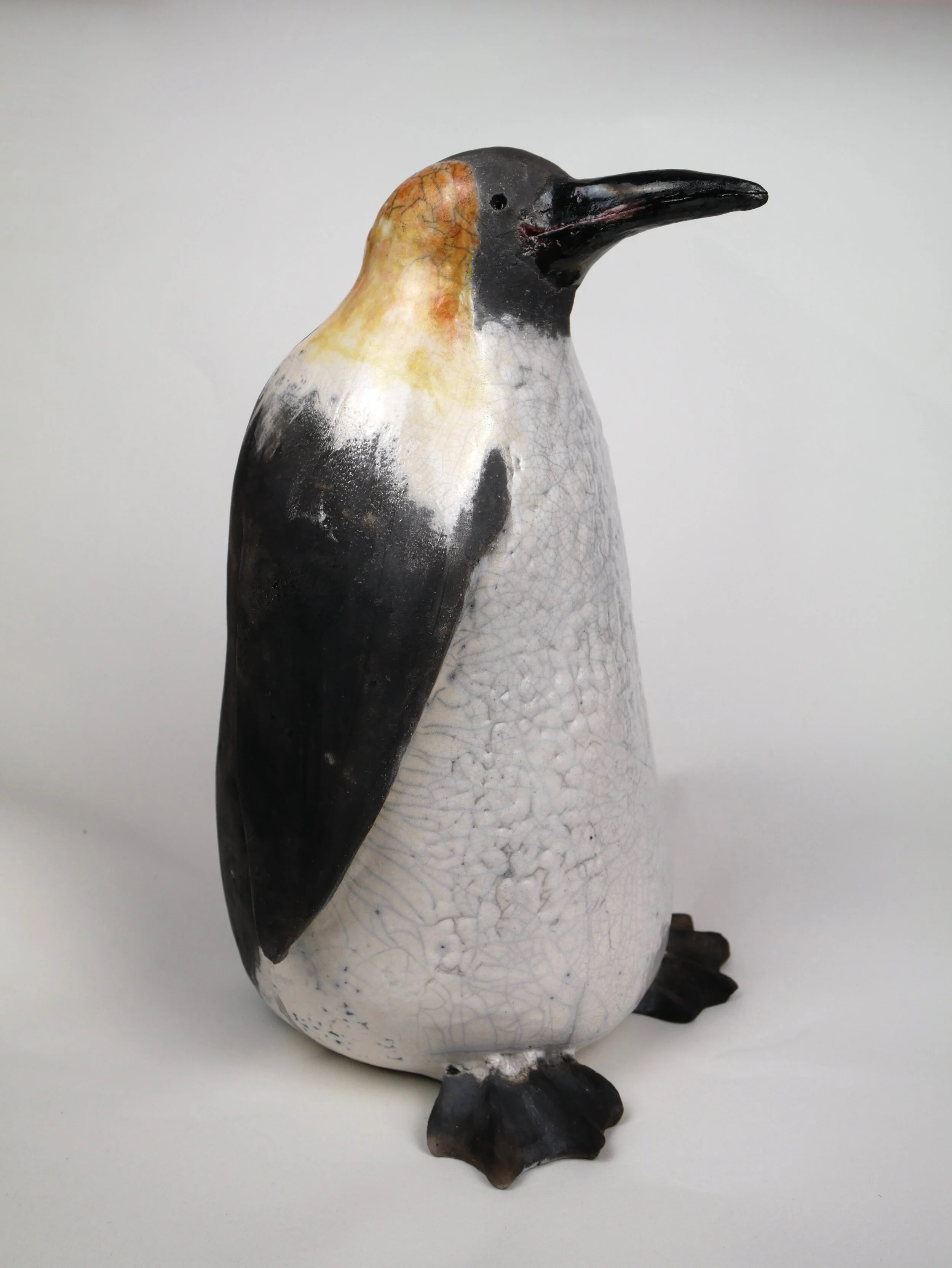 Emperor penguin sculpture - raku fired