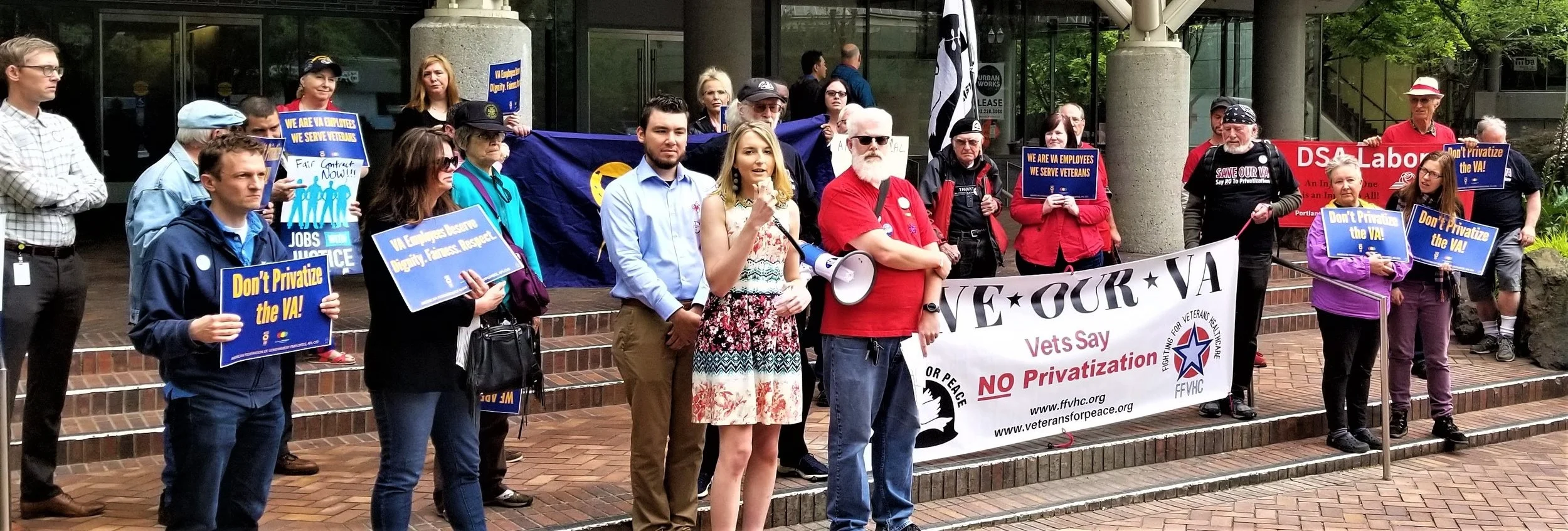 Paige Kreisman, the first woman to serve as an Indirect Fire Infantryman in the US Army, now a disabled veteran, speaks at the Portland “Save Our VA” rally in support of the VA workers union. (2019)
