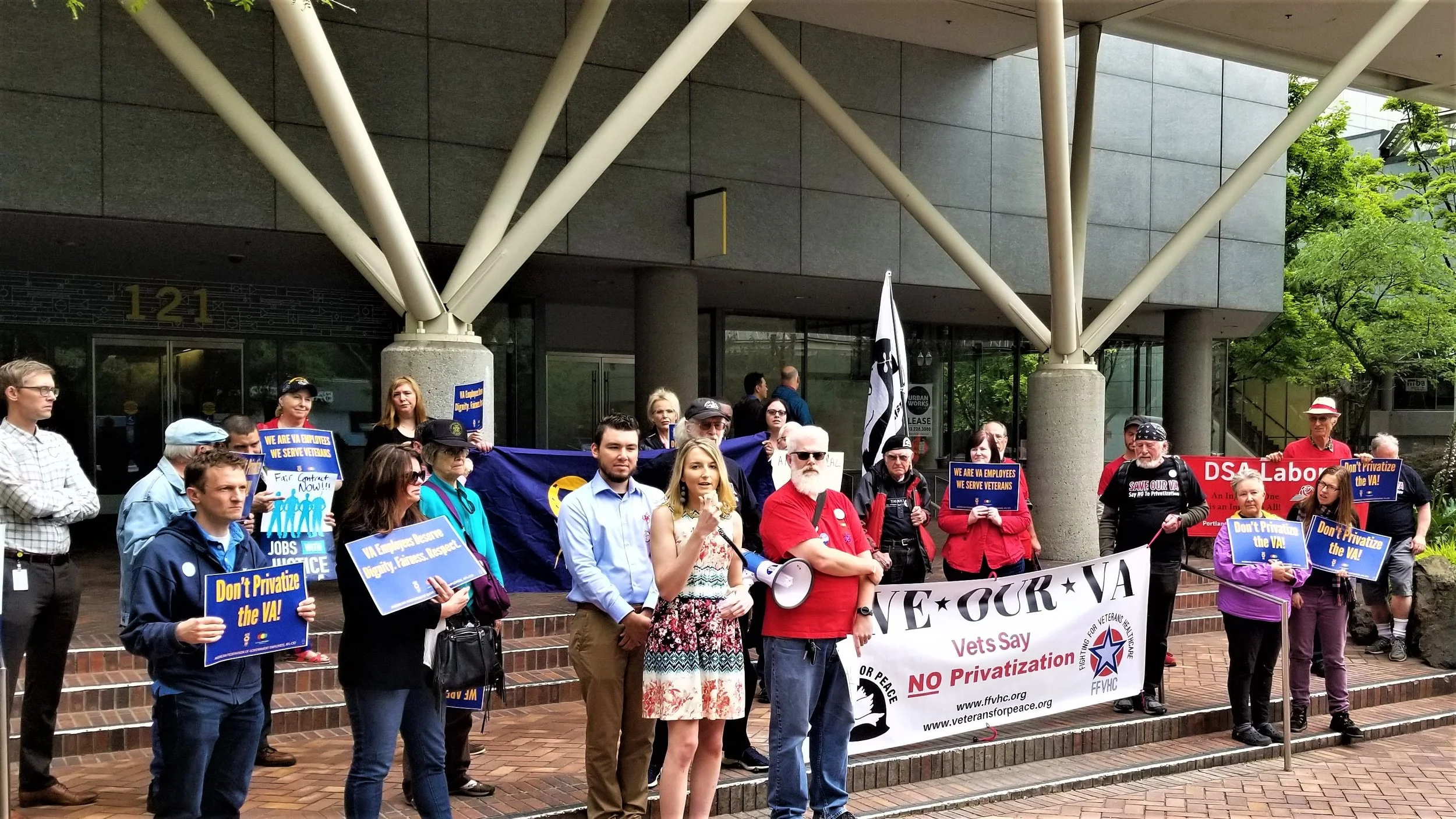 Paige, a disabled veteran, and the first woman to serve as an Indirect Fire Infatnryman in the US Army (a combat job previously open only to men) speaks at the “Save Our VA" rally on June 5th in downtown Portland. Paige was invited to speak in support of the VA workers Union.
