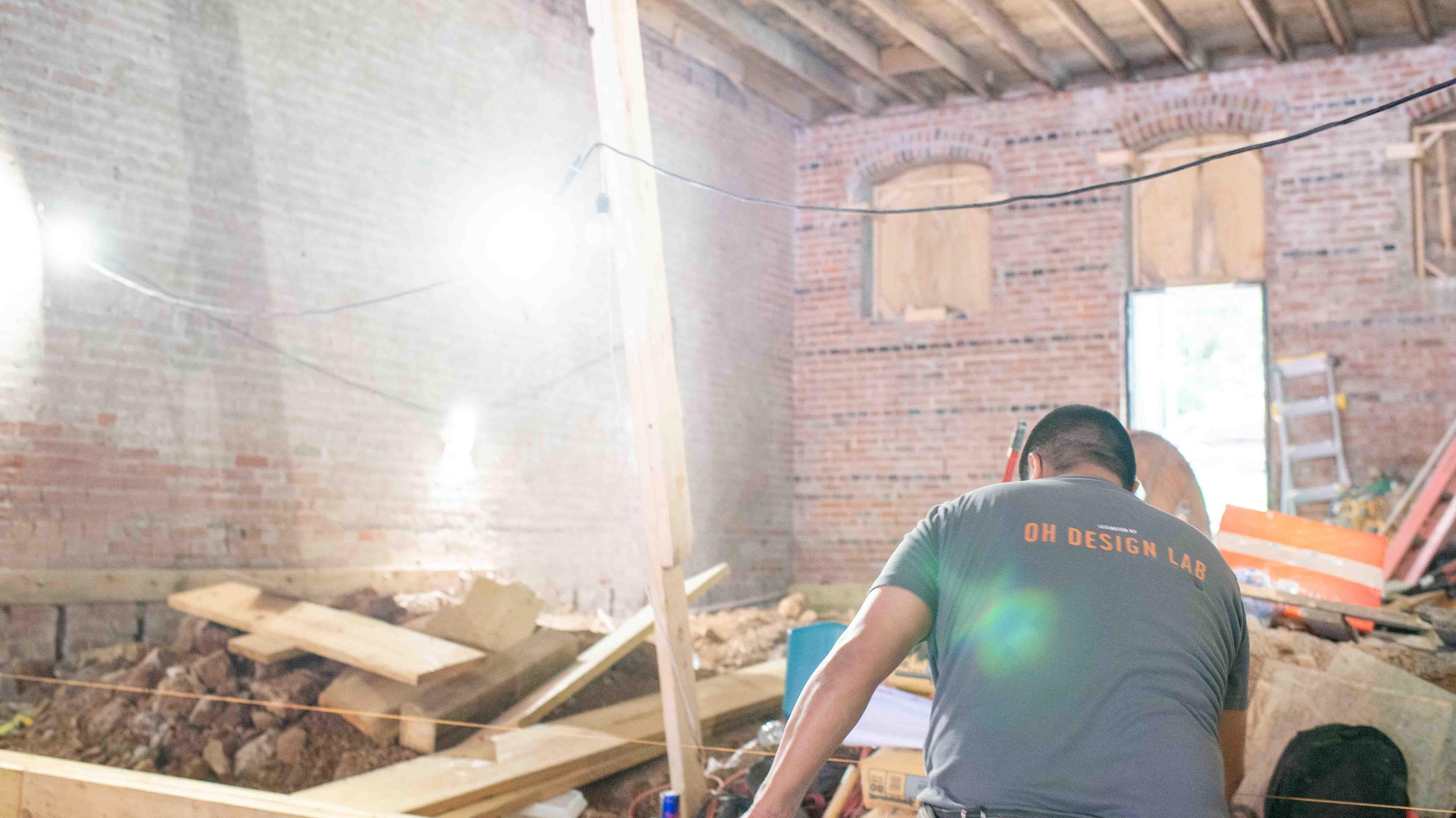 Structural preparation for transition from wood framing to concrete slab.