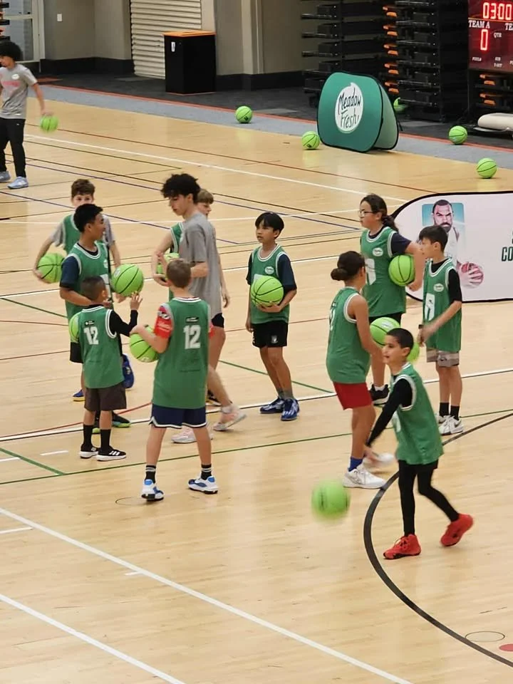 Cruz and griuof of kids Steven Adams Camp 2025.jpg