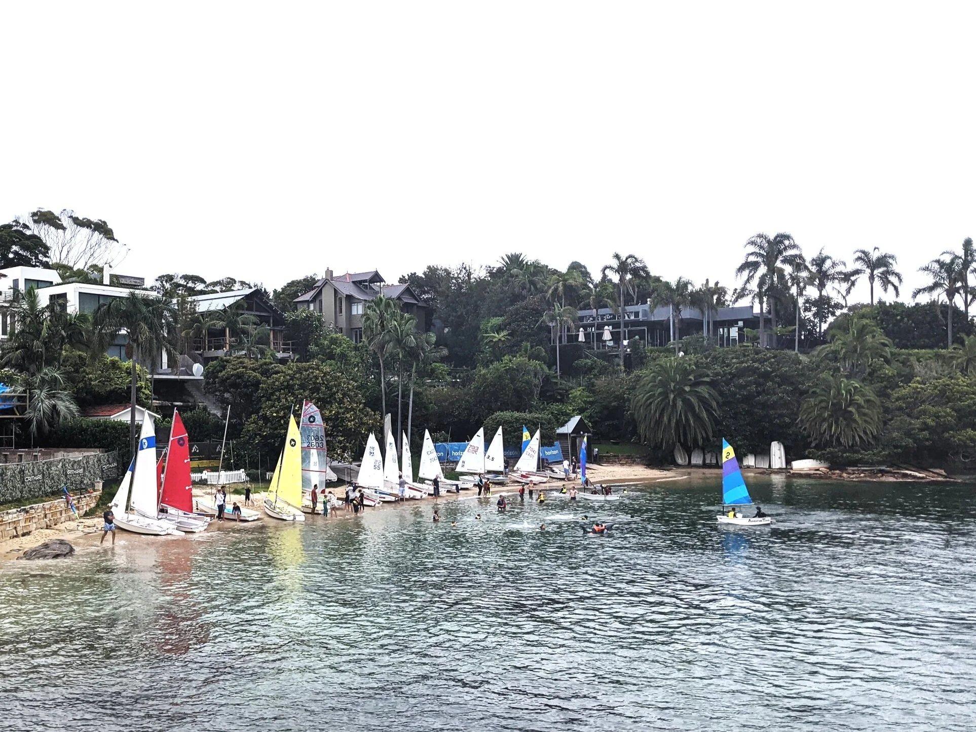A busy beach for the Start Sailing session at 8.30am last Sunday