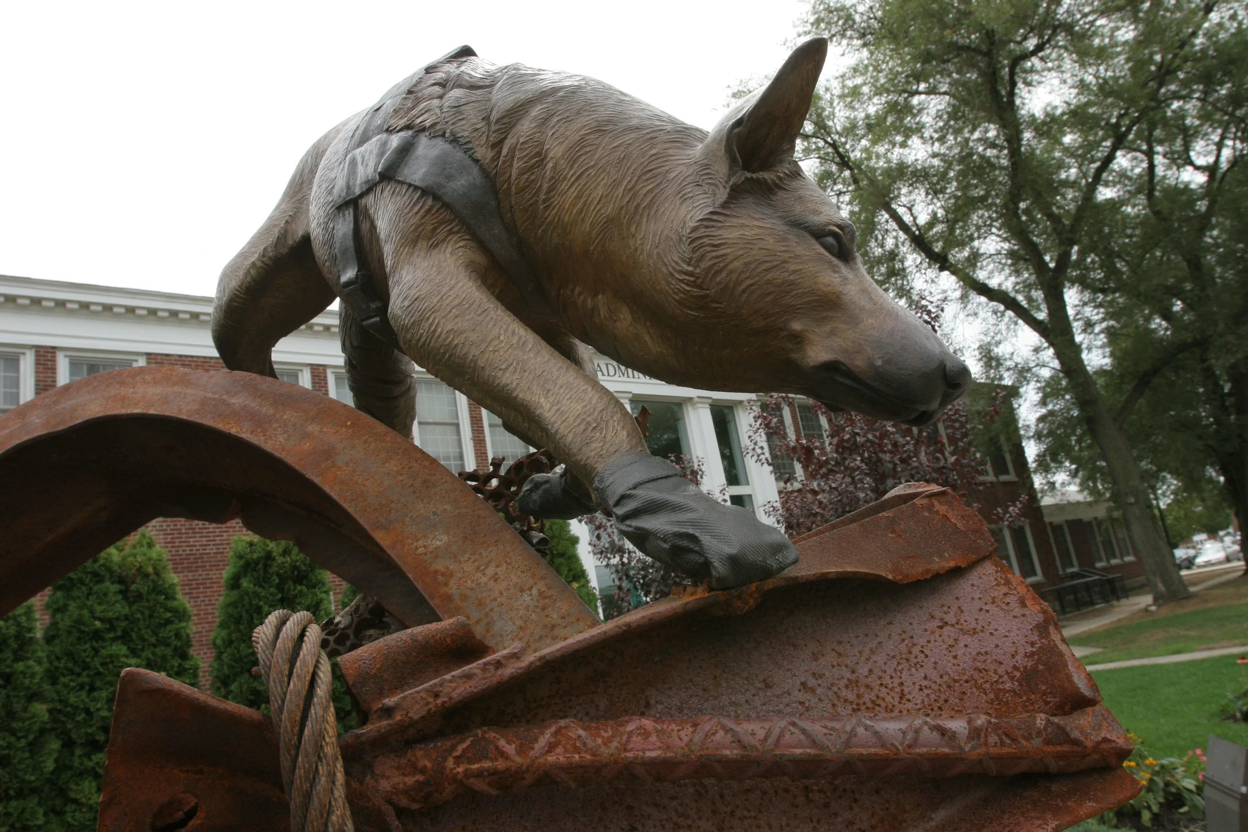 8/30/2005, Farmingdale. Photo shows 9/11 Memorial Garden. Bronze Sculpture of rescue dog searching among some original rubble from ground zero by Liza Todd-Tivey. Photo: Phil Marino