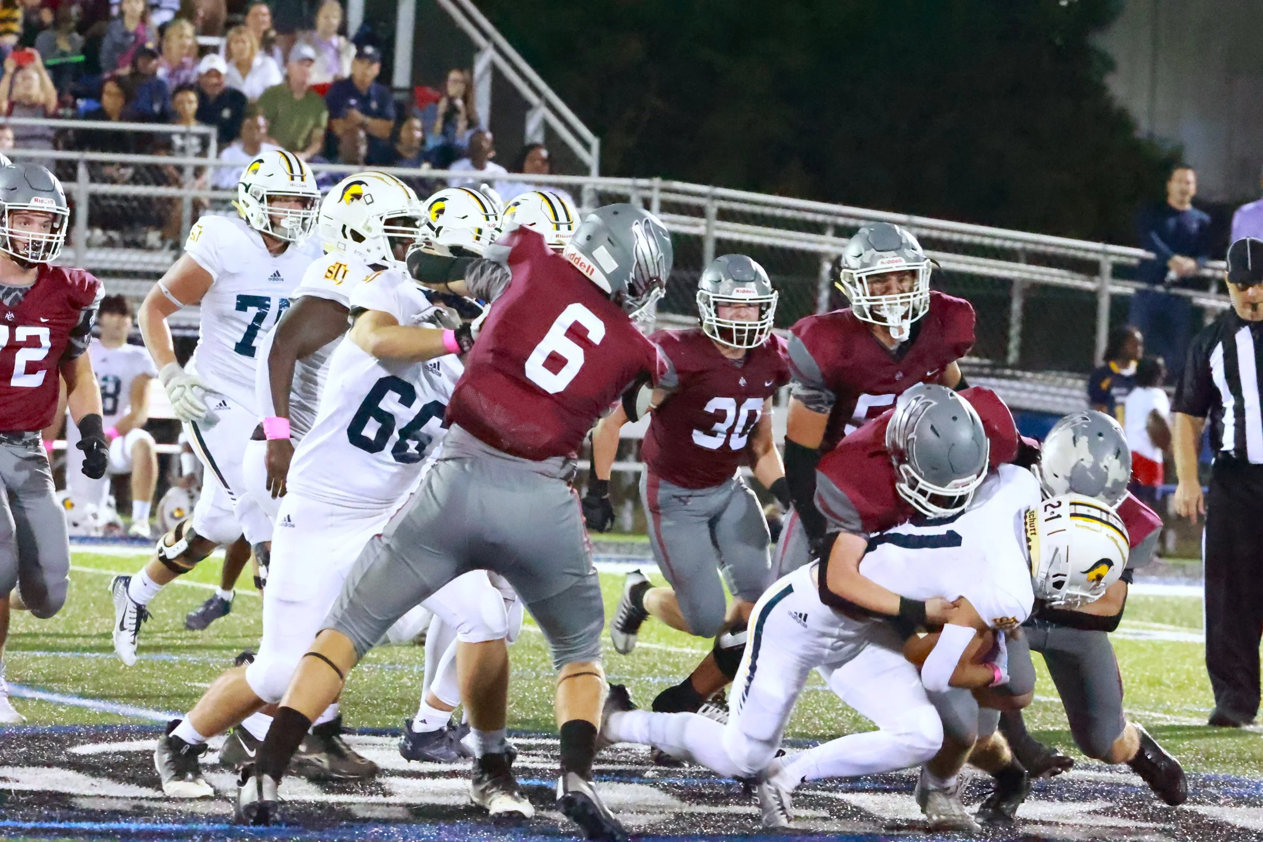 Eagles Fall to Trojans in Region Contest