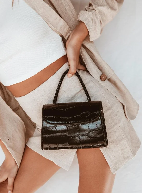 These mini bags just scream effortless to me. While they’re not the most practical for the daytime, they’re the perfect going out bag. I love the crocodile material on this one from Princess Polly as I think it gives it a a little edge.