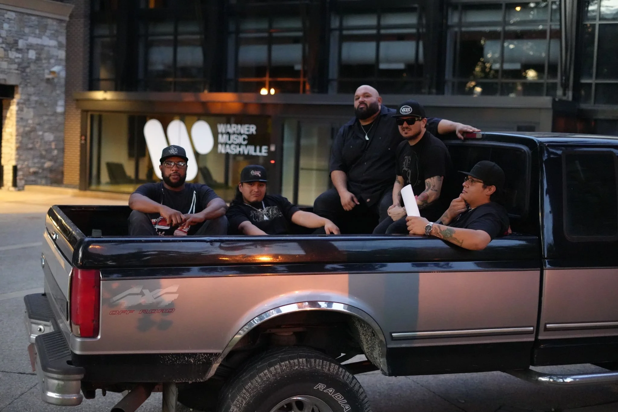 Giovannie and the Hired Guns sign to Warner Music Nashville