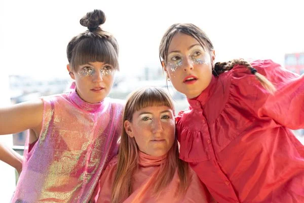 U.K. art-pop act Stealing Sheep announce 2022 U.K. tour, release "Never Gonna Live Up" music video