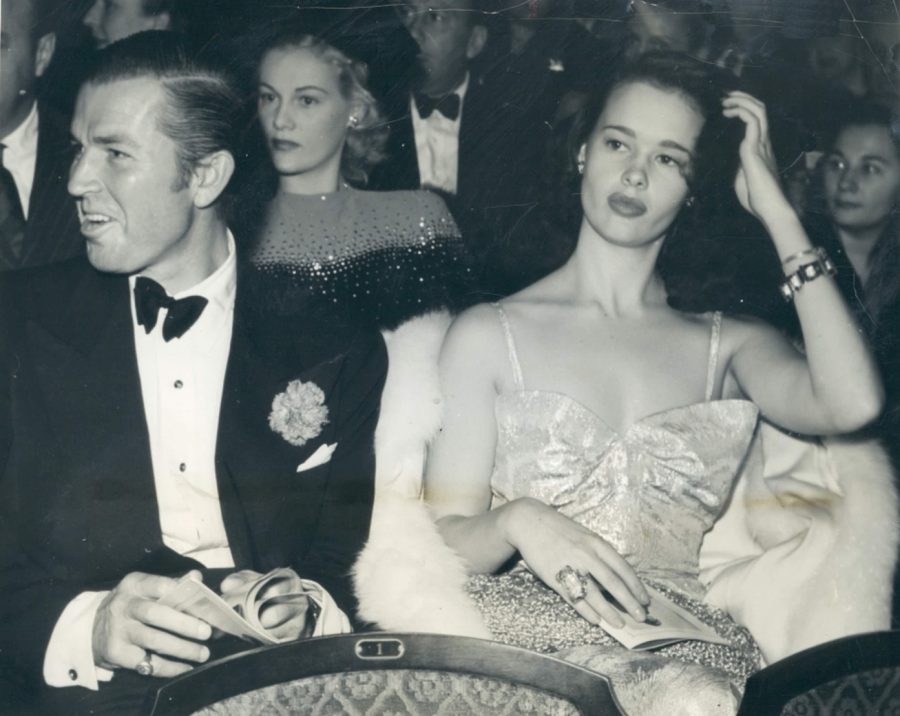 17 year-old Gloria Vanderbilt (right) and actor Bruce Cabot (left) attend the 1941 Premiere of “They Can’t Get You Down”Photo: Acme