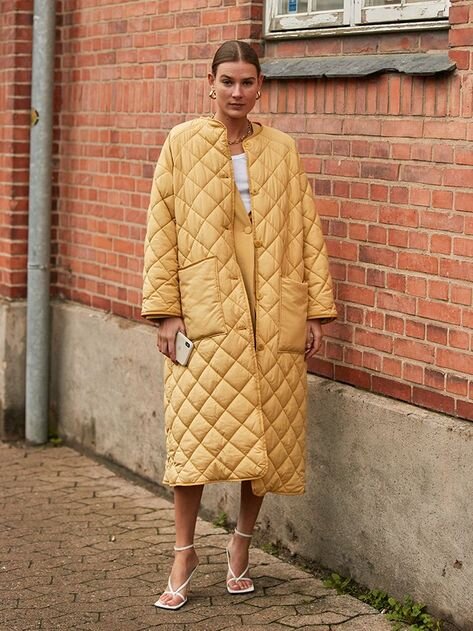 Vera Van Erp looks cozy and cool in a puffer-style trench. Photo: whowhatwear.com