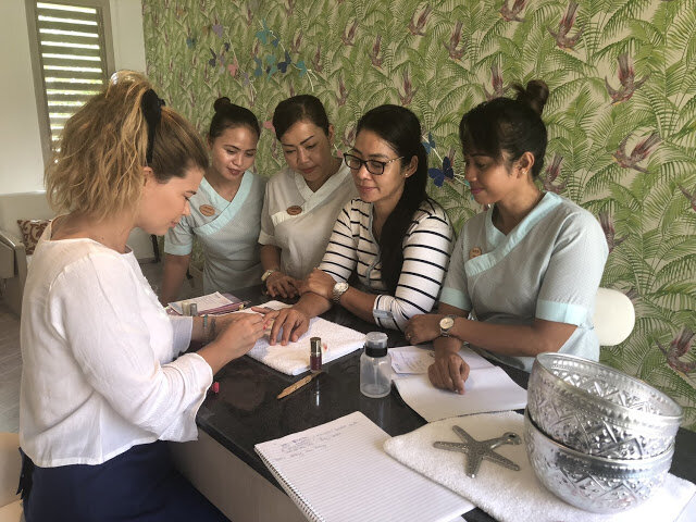Julie teaching a masterclass at Finolhu Maldives. Photo: nailmasterclass.com