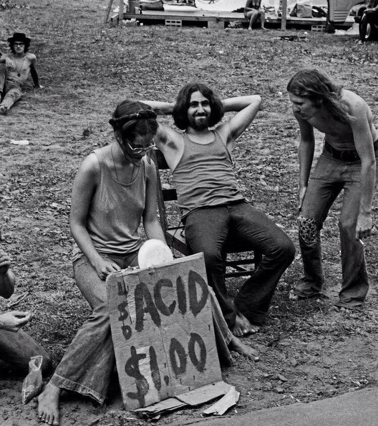 Woodstock attendees selling acid for $1.00, Bethel, NY, 1969.