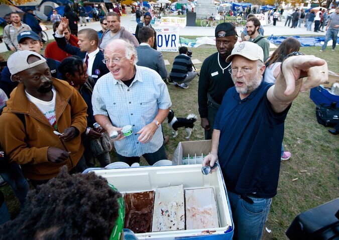 Ben Cohen (left) and Jerry Greenfield (right) passing out ice cream to Occupy Wall Street protesters in Washington in 2011. Photo: Paul J. Richards/Agence France-Press via Getty Images