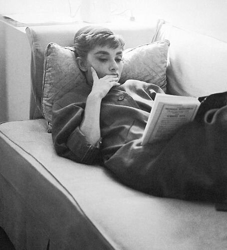 Audrey Hepburn taking a moment to read c.1950s, via Pinterest