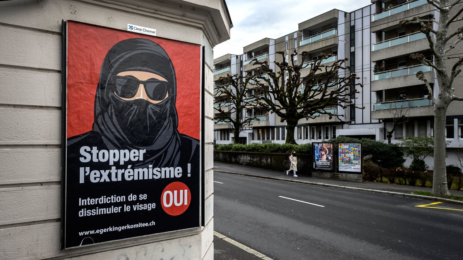A poster in Lausanne, Switzerland, reads "Stop extremism!" Source: Fabrice Coffrini/AFP via Getty Images