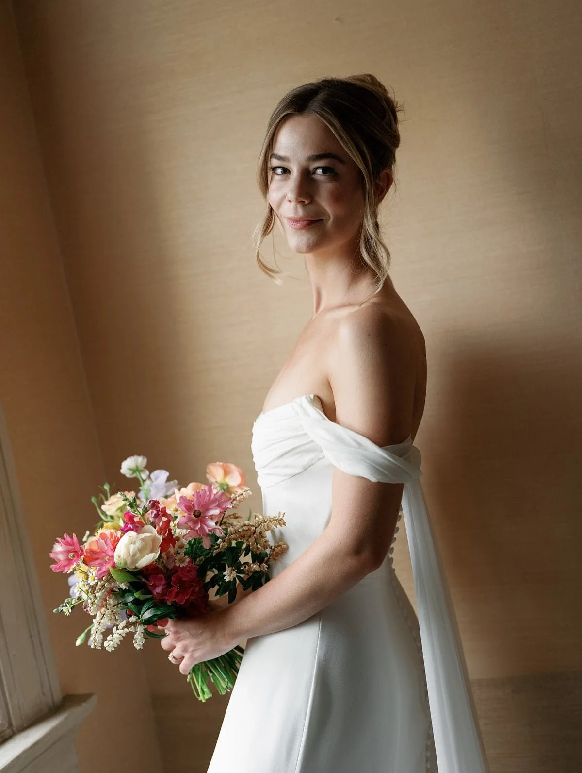 A bridal look that lives rent free in our heads. 
It&rsquo;s when everything clicks&mdash;
the dress, the details, the energy. And the bride.
Even with a rainy day forecast, H was radiant, relaxed, and with the most joyful energy. 
Because weddings a