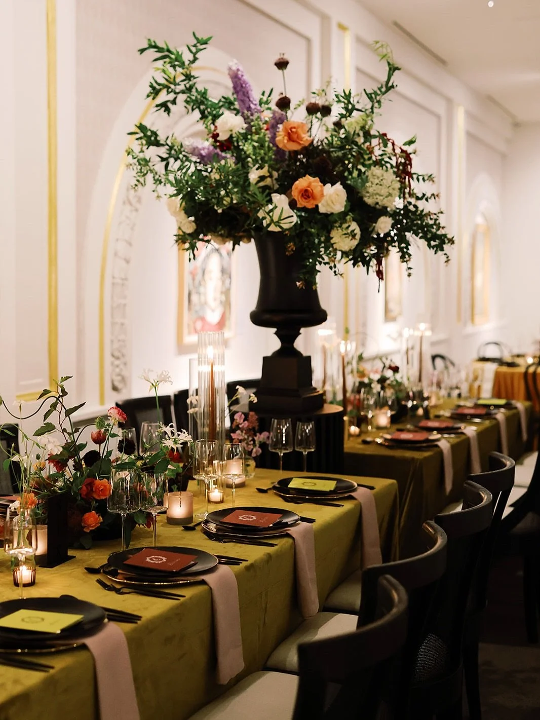 Modern New York edgy restaurant meets Old Hollywood glow.Lush, sculptural florals. Velvet textures. Candlelight everywhere.

An evening designed for connection &mdash; elegant, intimate, and alive.

A study in balance &mdash; modern lines, old-soul w