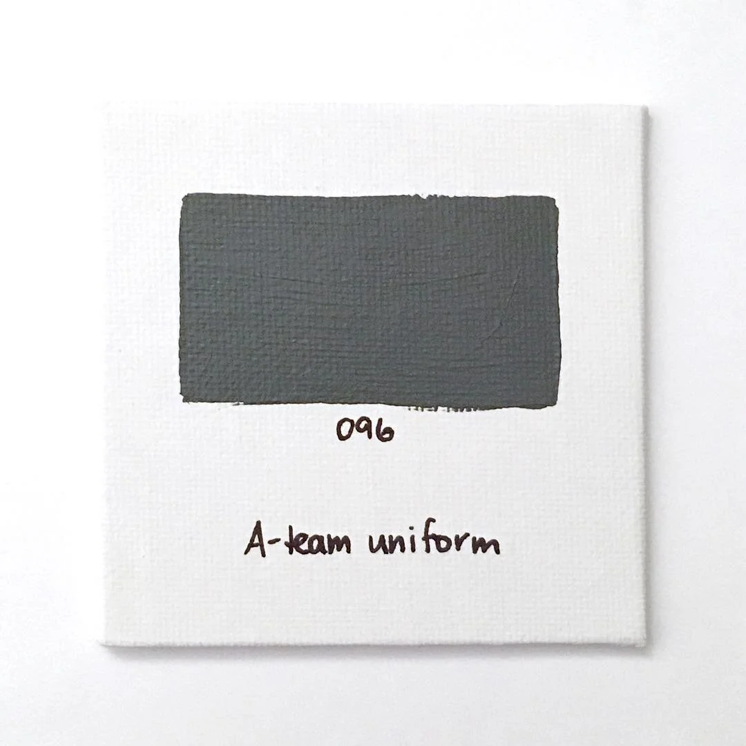 096 - My high school Academic Team was notorious for very strange team uniforms (picture quiz bowl after school in full-on lab coats). My junior and senior years, we had button-up gray mechanics shirts embroidered with our name, complemented by the w