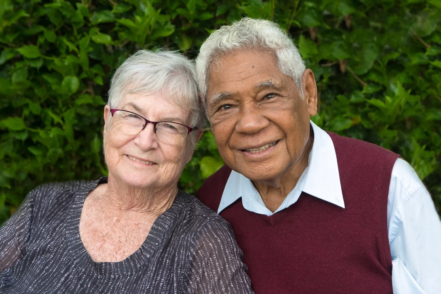 Older Couple Smiling in Park.jpg