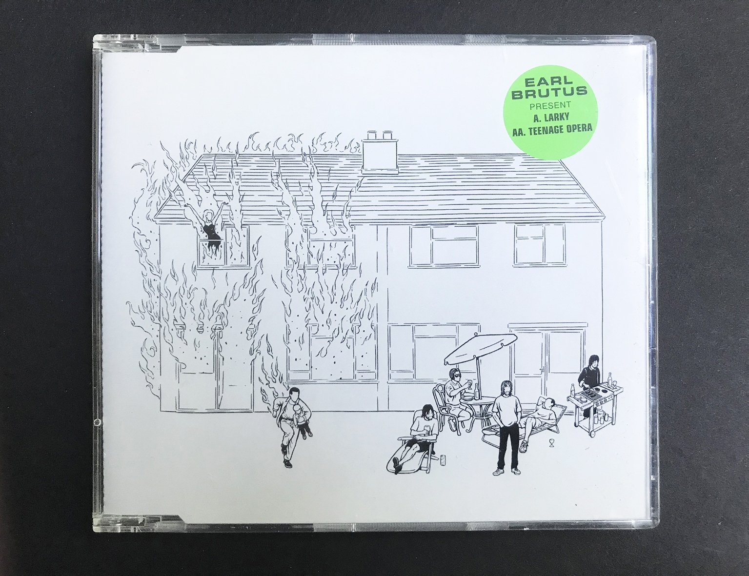 The ‘half house on fire’ illustration was also used on the cover of an Earl Brutus CD.