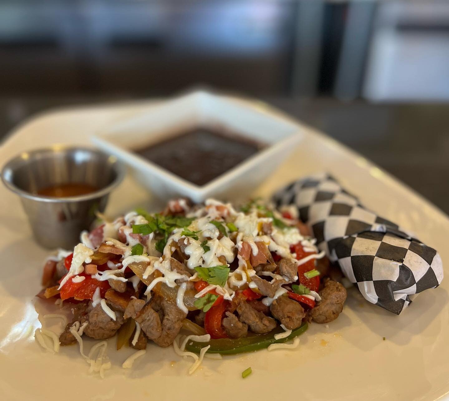 Our Special For this Weekend, 
A Mexican Specialty our 
✨ Alambre Plate! 😋
Grilled Carne Asada mixed with Onions, Bell Peppers, Ham, Bacon and Cheese. Served with Black Beans, Corn Torillas and Molcajete Salsa. 
 
#yummy #sealbeach #catrinacafe #ocf