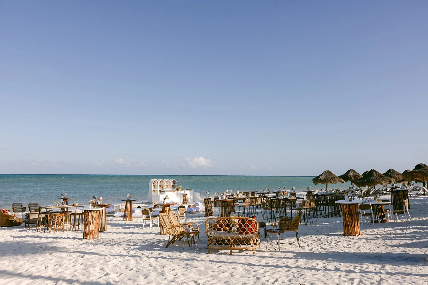 00 wide photo of welcome party rehearsal dinner reception decoration on the beach in cancun mexico riviera maya.jpg
