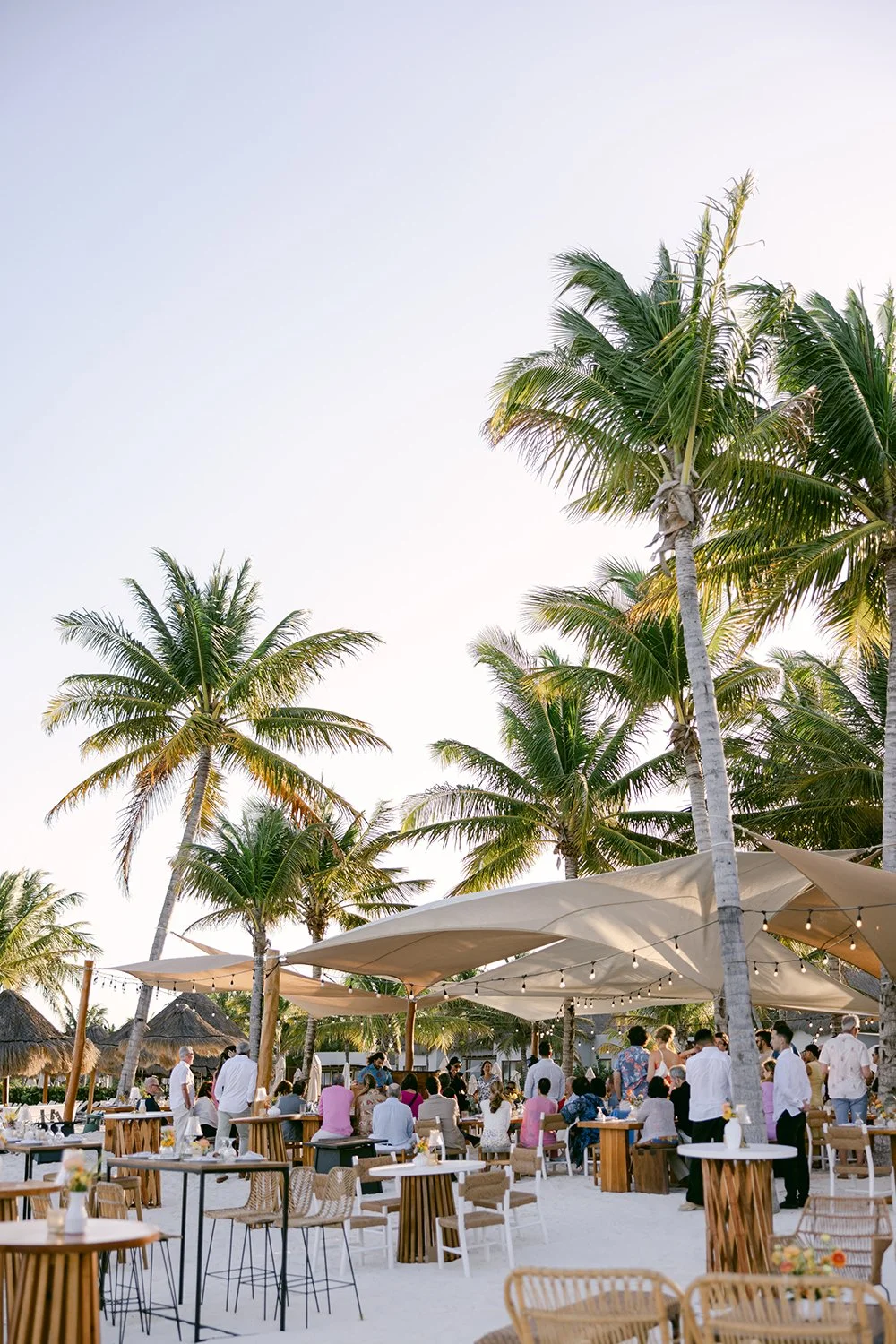 07 all welcome party guests hearing speeches by the beach amazing tropical decoration landscape.JPG