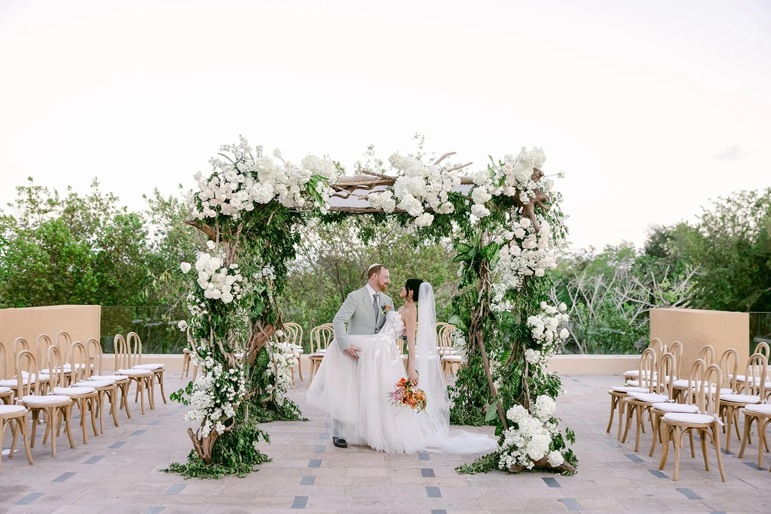 63 bride and groom posing under the huppah smiling looking at each other mayakoba riviera maya banyan tree cancun mexico.JPG