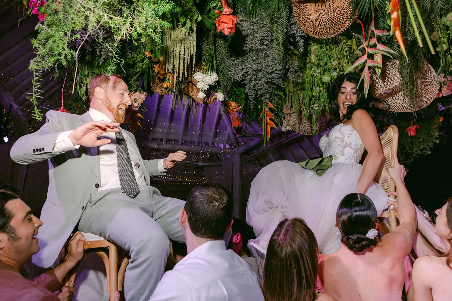 80 wedding guests lifting up bride and groom in the chairs mayakoba riviera maya banyan tree cancun mexico.JPG