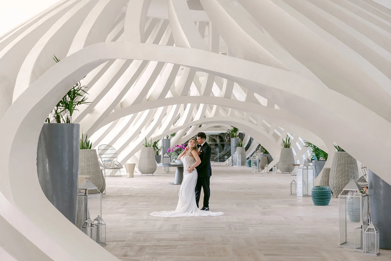 21 artistic photo in incredible venue site bride and groom posing smiling.JPG