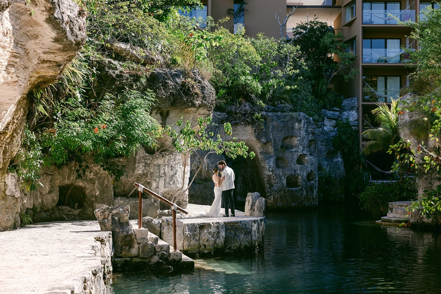 21 beautiful cover photo of bride and groom smiling and hugging in amazing tropical venue hotel xcaret cancun riviera maya mexico.JPG