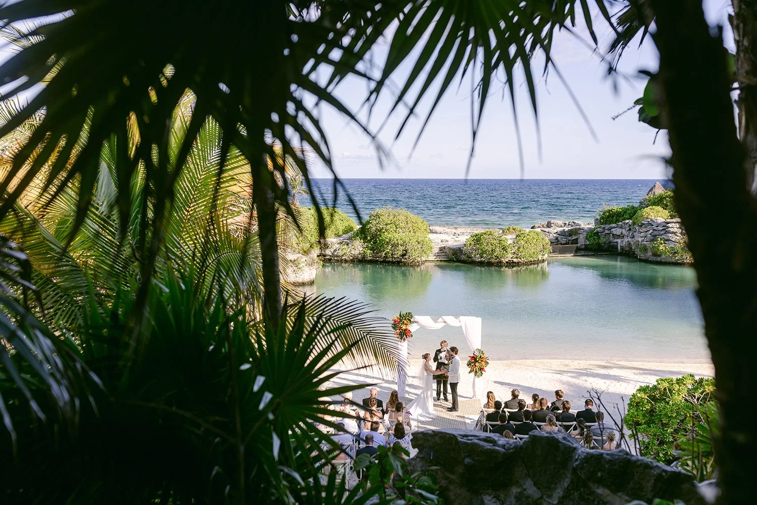 27 bride and groom getting married near the beach tropical view hotel xcaret cancun.JPG