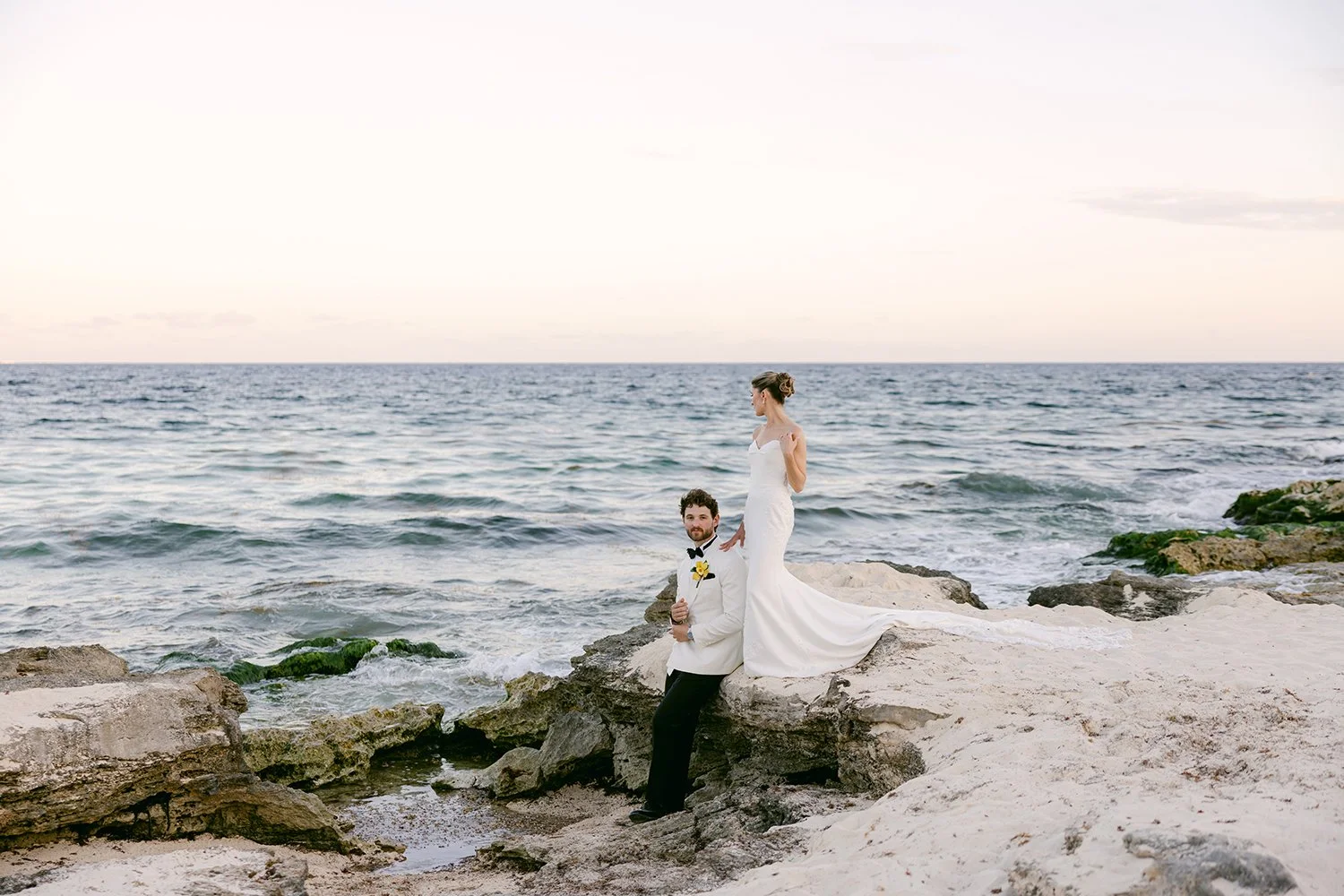 42 beautiful photo of bride and groom posing in natural landscape with ocean view.JPG