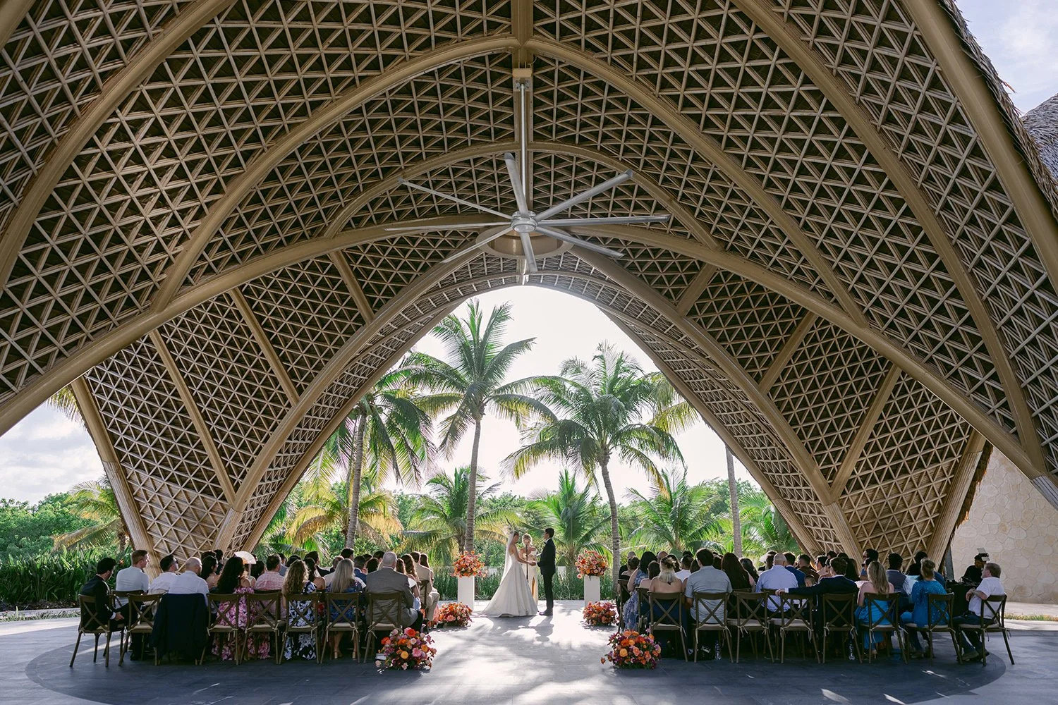 42 beautiful view of the wedding ceremony with all the wedding guests looking in garza blanca cancun riviera maya.JPG