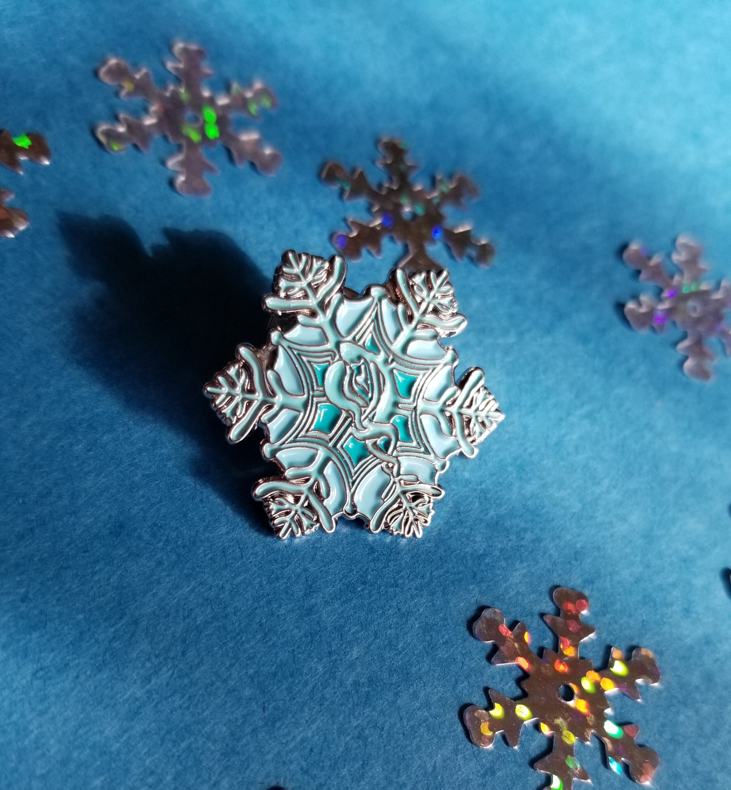 Snowflake-pin-lovers-inside-snowflake-enamel-pin.jpeg