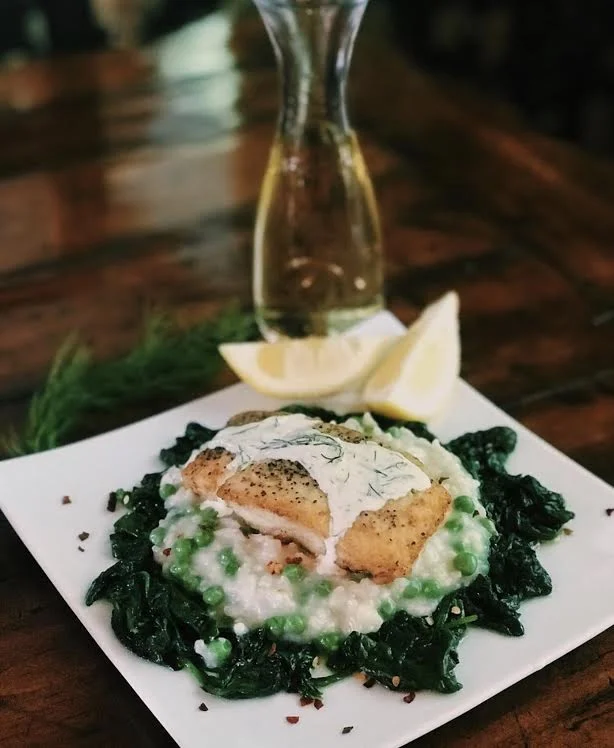 Pan Seared Halibut Over Lemon Pea Risotto