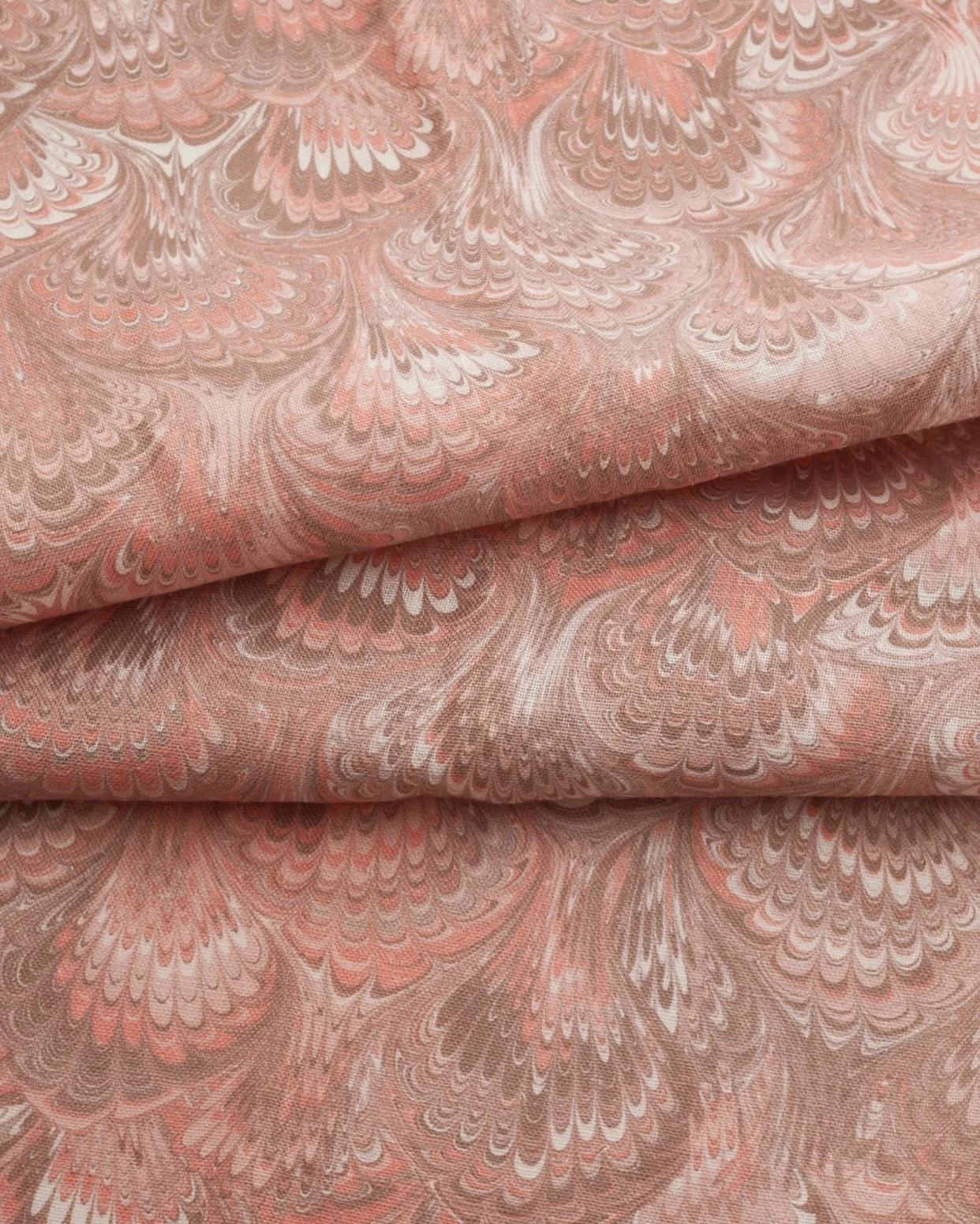 The art of marbling, reimagined in linen. Tania Vartan&rsquo;s Feathers in Peach is fluid, and unmistakably @taniavartan . Drawn from centuries-old marbling traditions and available in 4 delightful color ways. DM us for samples! 

#marbling #textiled