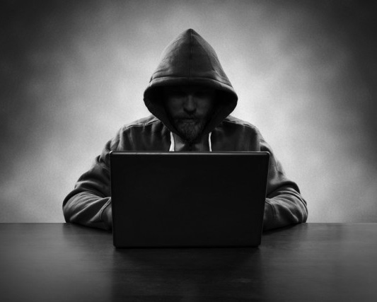 Hacker-desk-laptop-hoodie-hacking-hooded-e1466151608163-ConvertImage.jpg